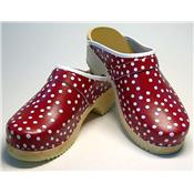 white dots on red clogs